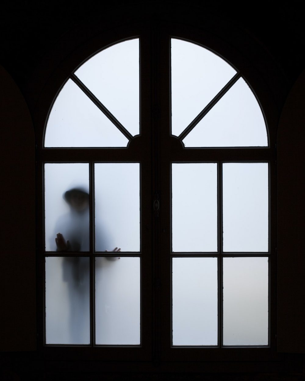 Silhouette near a window Silhouette near a window